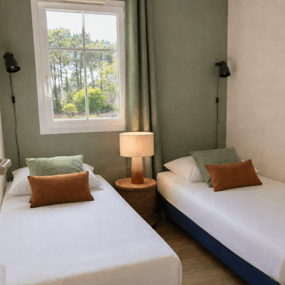 Chambre avec deux lits simples